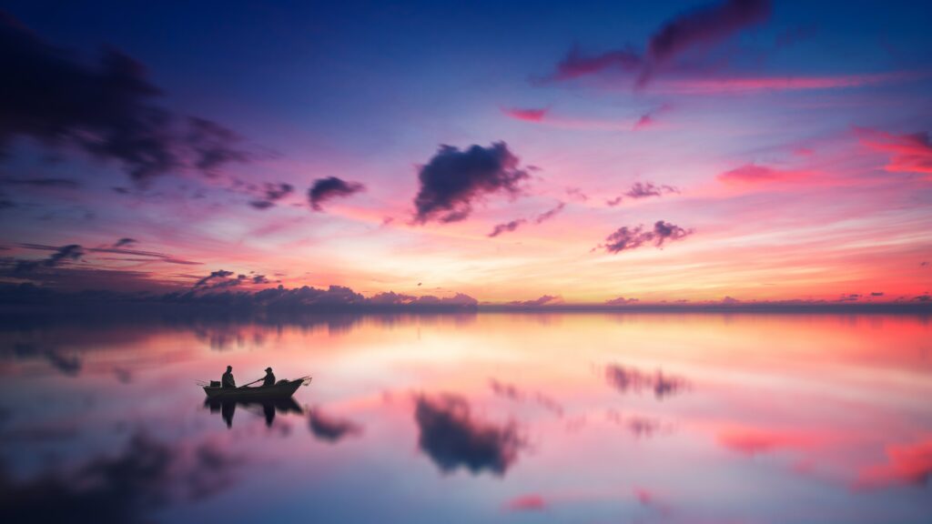 Boating at sunset reflects our spiritual journey that is enhanced with intuitive dreaming and astrology.
