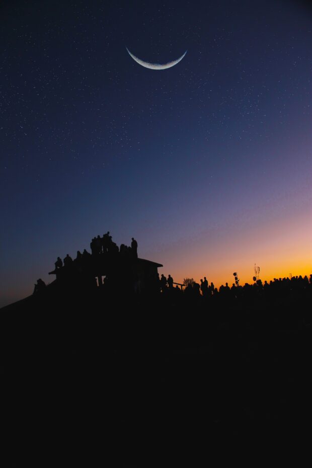 The crescent moon at sunset symbolizes opening to our intuitive dreams and astrology.