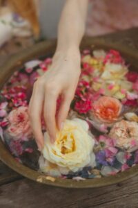 Flowers in a bowl. Flower essence therapy is a great spiritual astrology and plant medicine modality.