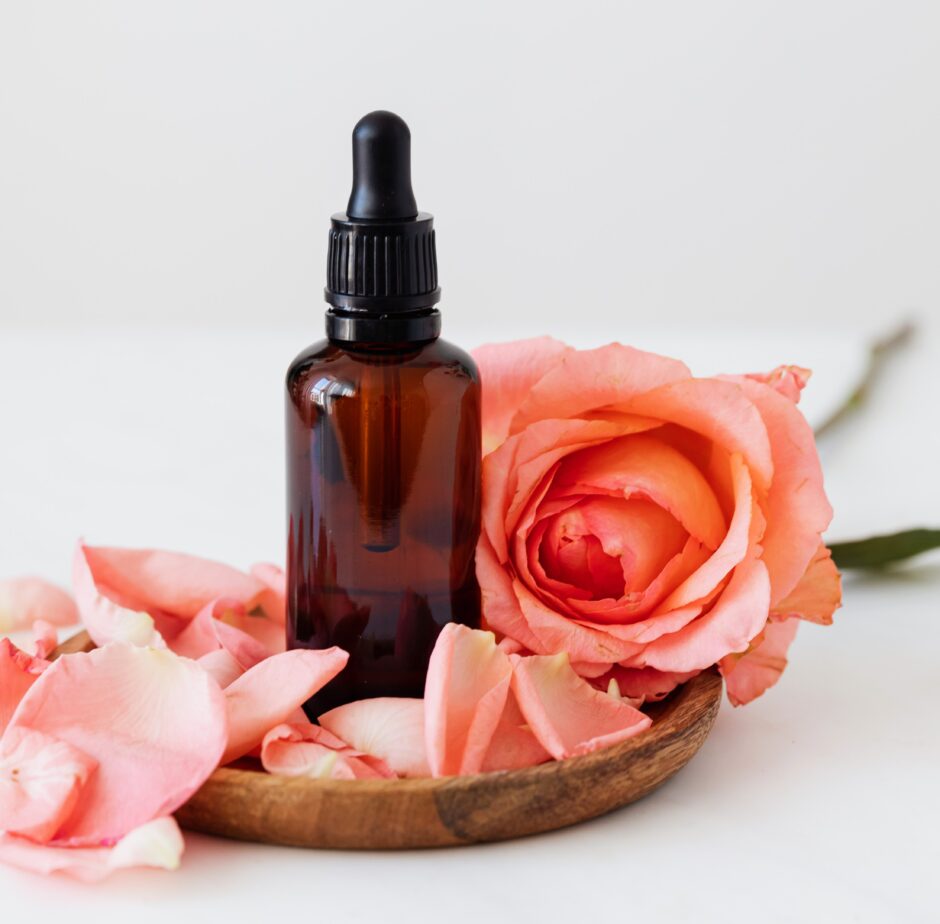 Roses and essence bottle